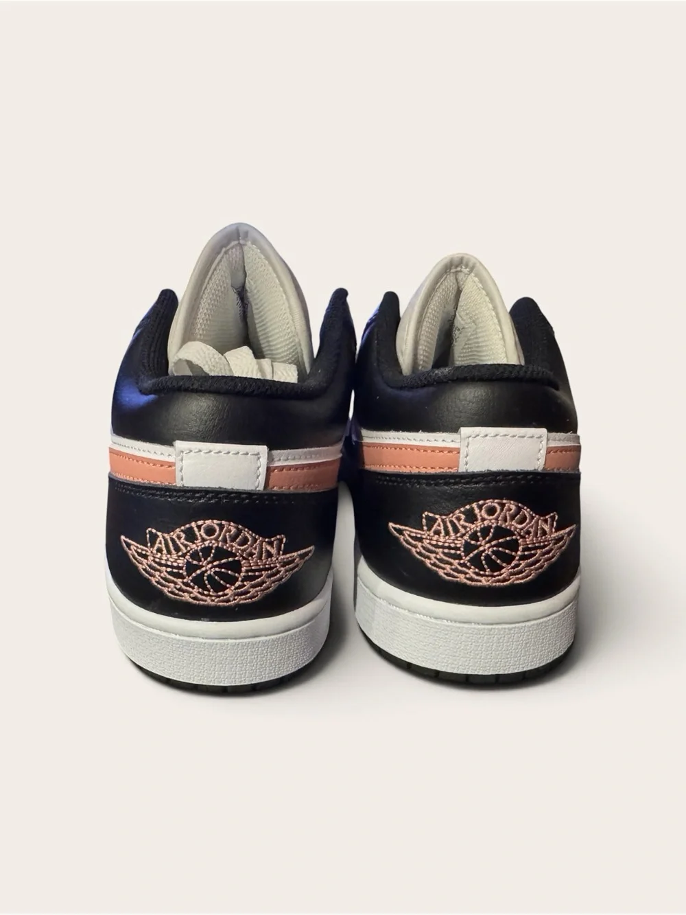 Air Jordan 1 Low “Rust Pink” / “Black Rust Pink.”